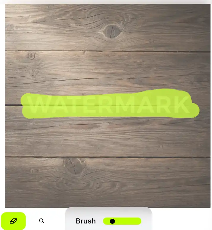 Cleanup.pictures final result shows a blurry whitish smudge where text existed, demonstrating why a purpose-built remove text from image tool better reconstructs texture continuity and preserves natural seams on wood grain.